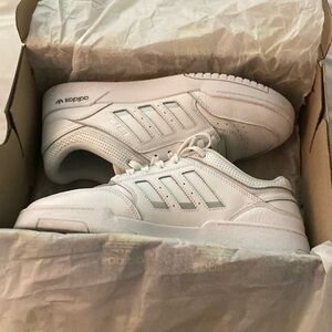 Men’s shoes worn once, trad a little dirty I can clean before shipping